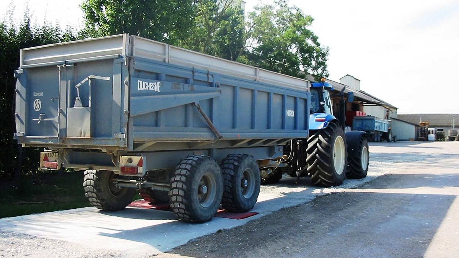 Why install an in-motion axle weighing system for grain storage on a farm?